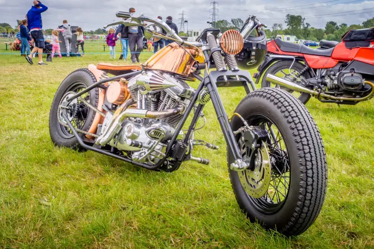 A restored classic motorcycle on display at the show