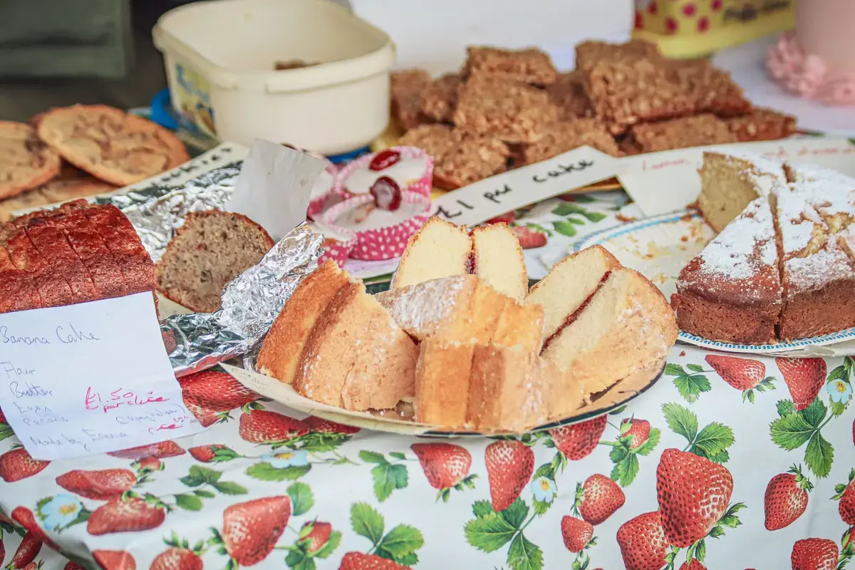 Baked entries and home-craft exhibits laid out for judging in the domestic competition